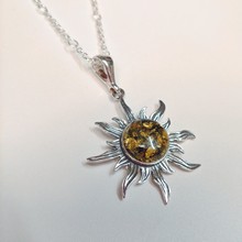 HWG-094 Pendant Sunburst Green Amber $50 at Hunter Wolff Gallery